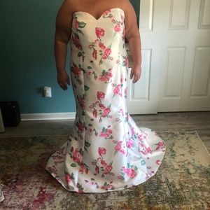 Clarissa prom dress with hot pink floral.  Size 28 with corseted back
